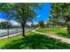 Community park with tennis courts, a playground, a swimming pool and a walking path at 5429 S Waco St, Centennial, CO 80015