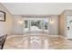 Inviting living room showcasing a large bay window, hardwood floors, and stylish lighting at 5429 S Waco St, Centennial, CO 80015