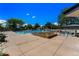 Community pool with ample seating, mature trees, and a bath house at 5429 S Waco St, Centennial, CO 80015