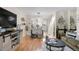 Bright dining area with table and chairs, open to the kitchen at 1811 S Quebec Way # 134, Denver, CO 80231