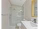 A modern bathroom featuring a glass enclosed shower, and a vanity with a quartz countertop at 13612 Plaster Cir, Broomfield, CO 80023