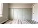 Neutral bedroom with painted panel accents and closet at 13612 Plaster Cir, Broomfield, CO 80023