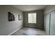 Comfortable bedroom with light grey walls and flooring at 13612 Plaster Cir, Broomfield, CO 80023