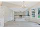 Bright living room with vaulted ceilings and view of the living area with a fireplace at 13612 Plaster Cir, Broomfield, CO 80023
