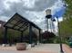 Community park featuring a scenic water tower, shaded gazebo, and inviting green spaces at 5420 Allison St # 202, Arvada, CO 80002
