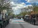 A vibrant street scene with colorful street art and inviting outdoor seating areas for the various businesses at 5420 Allison St # 202, Arvada, CO 80002