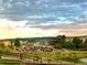 Outdoor community event by the pond, showcasing a gathering in a scenic setting at 9804 N Crystal Lake Dr, Littleton, CO 80125