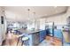 Beautiful kitchen featuring an island with barstool seating, stainless appliances and open concept at 9804 N Crystal Lake Dr, Littleton, CO 80125