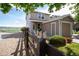 Well-maintained home with a charming fence, a manicured yard, and a convenient attached single-car garage at 2296 E 109Th Dr, Northglenn, CO 80233
