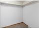 Unfinished closet space with neutral walls and carpet ready for customization at 1400 S Knox Ct, Denver, CO 80219