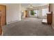 Cozy living room with large windows and lots of light at 1400 S Knox Ct, Denver, CO 80219