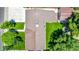 Aerial view of a home with a well-maintained brown roof and lush green lawn at 9170 Aspen Dr, Thornton, CO 80229