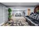 Spacious basement featuring a sitting area, exercise equipment, and carpet at 9170 Aspen Dr, Thornton, CO 80229
