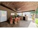 Covered outdoor patio featuring seating, grill, and bar area for entertaining guests at 9170 Aspen Dr, Thornton, CO 80229