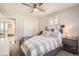 Cozy bedroom with a built-in bookshelf and a comfortable bed at 4481 W 89Th Way, Westminster, CO 80031