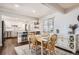 Light-filled dining area with a table and chairs, adjacent to the kitchen at 4481 W 89Th Way, Westminster, CO 80031