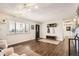 Bright and airy entryway with dark hardwood floors and a coat rack at 4481 W 89Th Way, Westminster, CO 80031