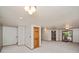 Spacious basement with neutral carpet, ample lighting and access to the outside at 837 Meadow Run, Golden, CO 80403