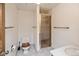Bright and clean bathroom featuring a tiled floor and glass shower at 837 Meadow Run, Golden, CO 80403