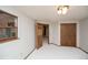 Bedroom with neutral carpet, closet, and natural light at 837 Meadow Run, Golden, CO 80403