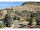 A charming house with a mountain backdrop in a quiet, tree-lined neighborhood at 837 Meadow Run, Golden, CO 80403