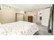 Basement bedroom features neutral colors, carpet flooring, and ample natural light at 1795 N Monaco St Pkwy, Denver, CO 80224