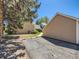 Exterior shot of the driveway with reserved parking and well maintained exterior at 13598 E Asbury Dr, Aurora, CO 80014