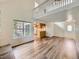 Bright, open living area with wood floors and lots of natural light at 13598 E Asbury Dr, Aurora, CO 80014