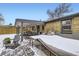 A covered back patio features brick pavers and an outdoor kitchen at 424 S Leyden St, Denver, CO 80224