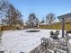 Snowy backyard with trampoline and patio at 424 S Leyden St, Denver, CO 80224