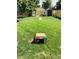 Backyard with cornhole and sheds at 424 S Leyden St, Denver, CO 80224