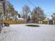 Snowy backyard with trampoline and shed at 424 S Leyden St, Denver, CO 80224