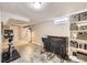 Finished basement features an exercise area with a bar, and shelving with baskets at 424 S Leyden St, Denver, CO 80224