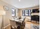 Bright dining area with hardwood floors and large windows at 424 S Leyden St, Denver, CO 80224