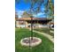 Charming single-story home featuring a well-manicured lawn, brick accents, and inviting curb appeal at 424 S Leyden St, Denver, CO 80224