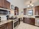 Modern kitchen with stainless steel appliances and granite countertops at 424 S Leyden St, Denver, CO 80224