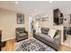 Cozy living room with hardwood floors and kitchen view at 424 S Leyden St, Denver, CO 80224