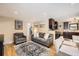 Open-concept living space with living, dining, and kitchen areas, perfect for entertaining at 424 S Leyden St, Denver, CO 80224