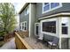 Inviting back deck with seating, perfect for outdoor relaxation and enjoying the surrounding views at 5550 Fox Meadow Ave, Highlands Ranch, CO 80130