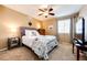 Cozy bedroom showcasing a comfortable bed, soft lighting, and stylish furnishings at 5550 Fox Meadow Ave, Highlands Ranch, CO 80130