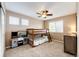 Bedroom featuring bunkbeds, ceiling fan, carpet, and play kitchen at 5550 Fox Meadow Ave, Highlands Ranch, CO 80130