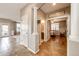 Open hallway leading to the bedroom, bathroom, and outdoor patio at 5550 Fox Meadow Ave, Highlands Ranch, CO 80130