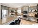 Modern kitchen featuring stainless steel appliances, a central island, and sleek gray cabinetry at 5550 Fox Meadow Ave, Highlands Ranch, CO 80130
