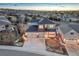 Aerial view of a two-story home nestled in a well-planned community at sunset at 2957 Eagle Wing Way, Castle Rock, CO 80109