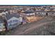 Night aerial of home with solar panels and community lighting at 2957 Eagle Wing Way, Castle Rock, CO 80109