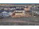 Night aerial view showing home with solar panels, backyard, and distant city lights at 2957 Eagle Wing Way, Castle Rock, CO 80109