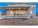 Rear view of a covered patio featuring durable construction and modern design elements at 2957 Eagle Wing Way, Castle Rock, CO 80109