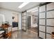 Basement with unique doors, a polished floor, and access to a bathroom at 1913 Five Iron Dr, Castle Rock, CO 80104