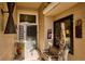 Inviting front porch with unique artistic elements and decorative touches adding character to the home's entrance at 1913 Five Iron Dr, Castle Rock, CO 80104