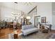 Bright and airy living room with high ceilings and an open floor plan at 1913 Five Iron Dr, Castle Rock, CO 80104